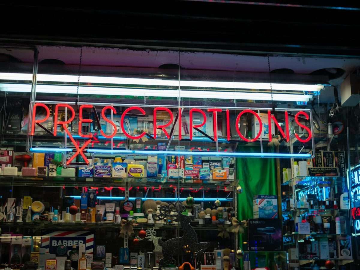 prescriptions sign on a drug store front
