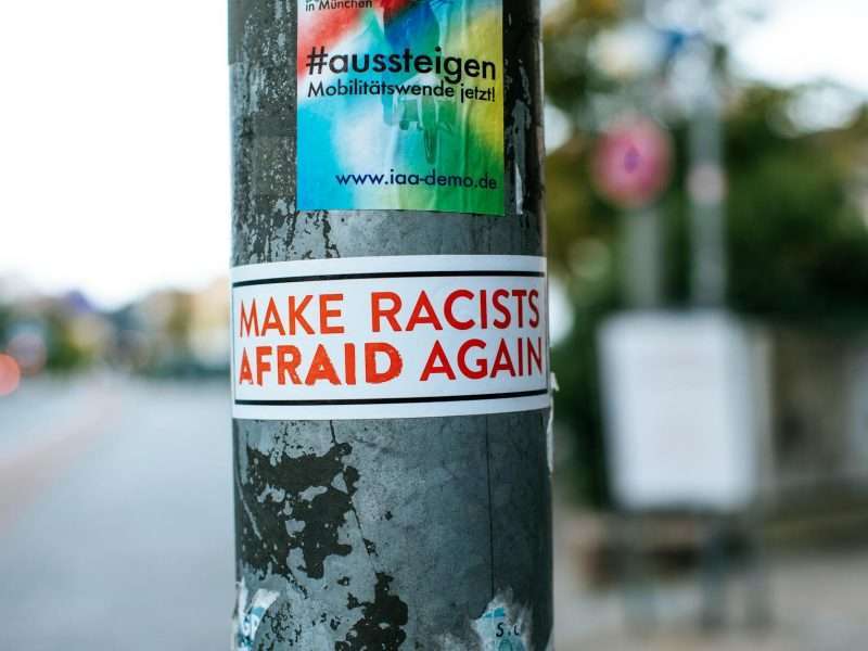 a sign posted on a metal pole